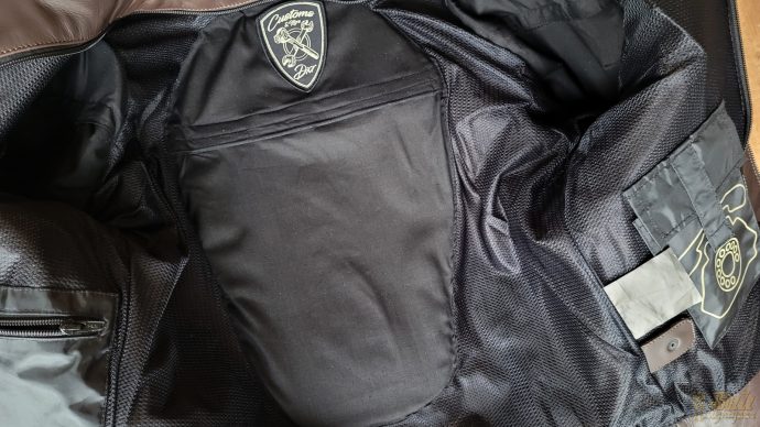 poche dorsale intégrée au blouson DXR Linus Rider