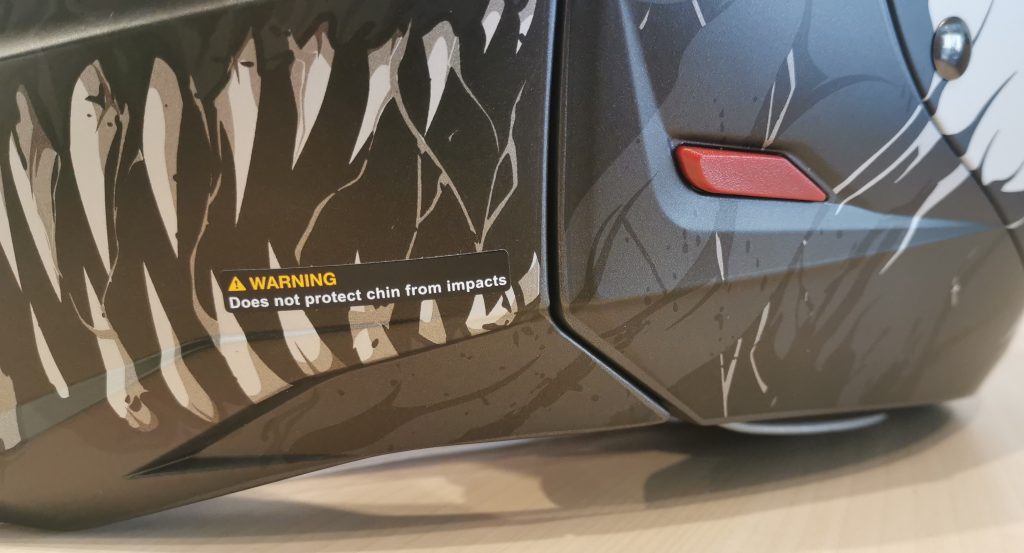 HJC i20 – bouton mentonnière et sticker